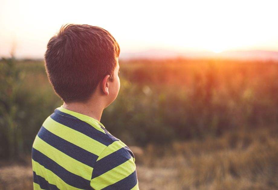 Child looking into the distance